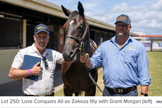 Lot 250: Love Conquers All ex Zekeza filly with Grant Morgan (left) m